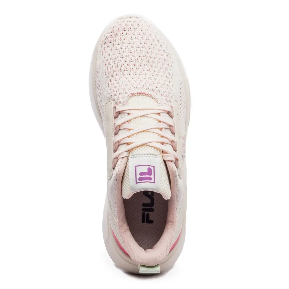 Tênis feminino Fila Freestyle II bege em destaque com foco no solado e design moderno